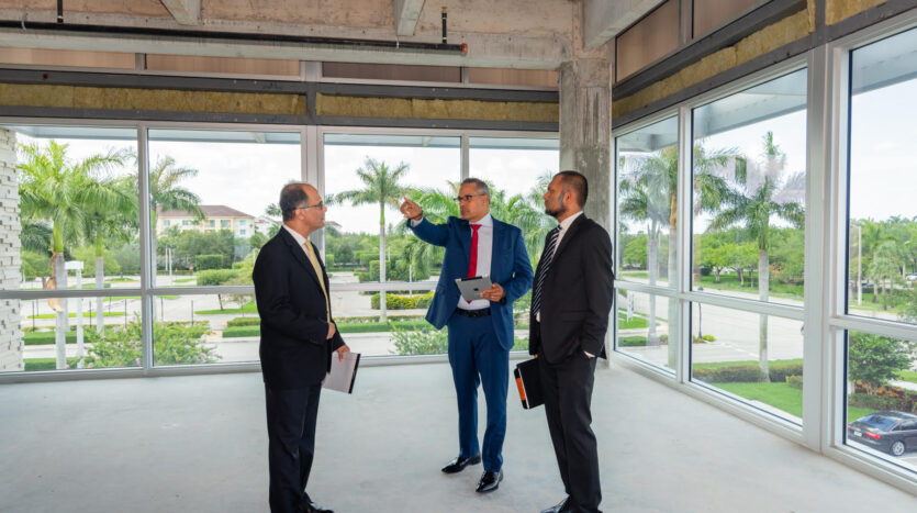 CMV Commercial agents meeting with South Florida business owners to analyze properties and identify ideal commercial real estate opportunities.